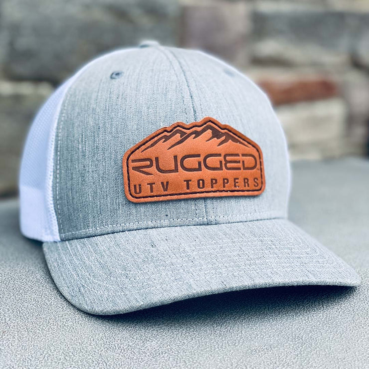 https://ruggedtoppers.com/cdn/shop/products/Rugged-truckerhat-gray-white_740x.jpg?v=1638895599
